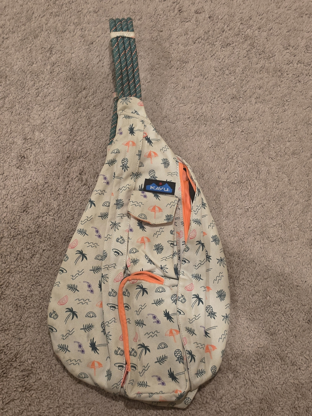KAVU Sling Bag in Cream Beach Print